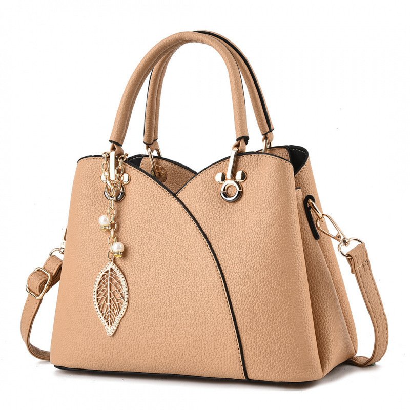 Premium Women’s Leaf Charm Handbag – Elegant Textured Leather Shoulder & Crossbody Bag Prime 129 - Image 6