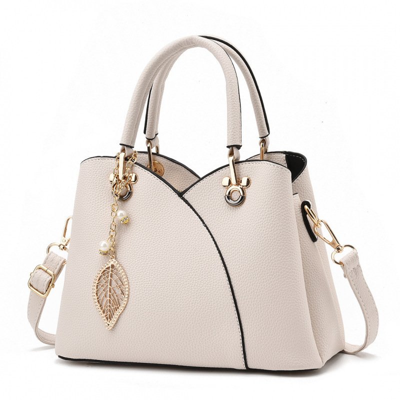 Premium Women’s Leaf Charm Handbag – Elegant Textured Leather Shoulder & Crossbody Bag Prime 129 - Image 4